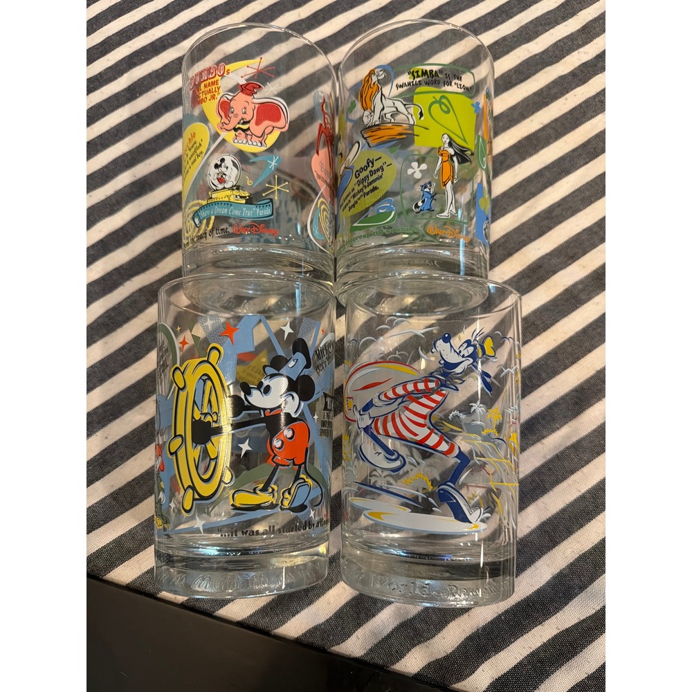 Disney McDonalds 100 Years of Magic Glasses Set of 4 Mickey Dumbo Goofy Simba